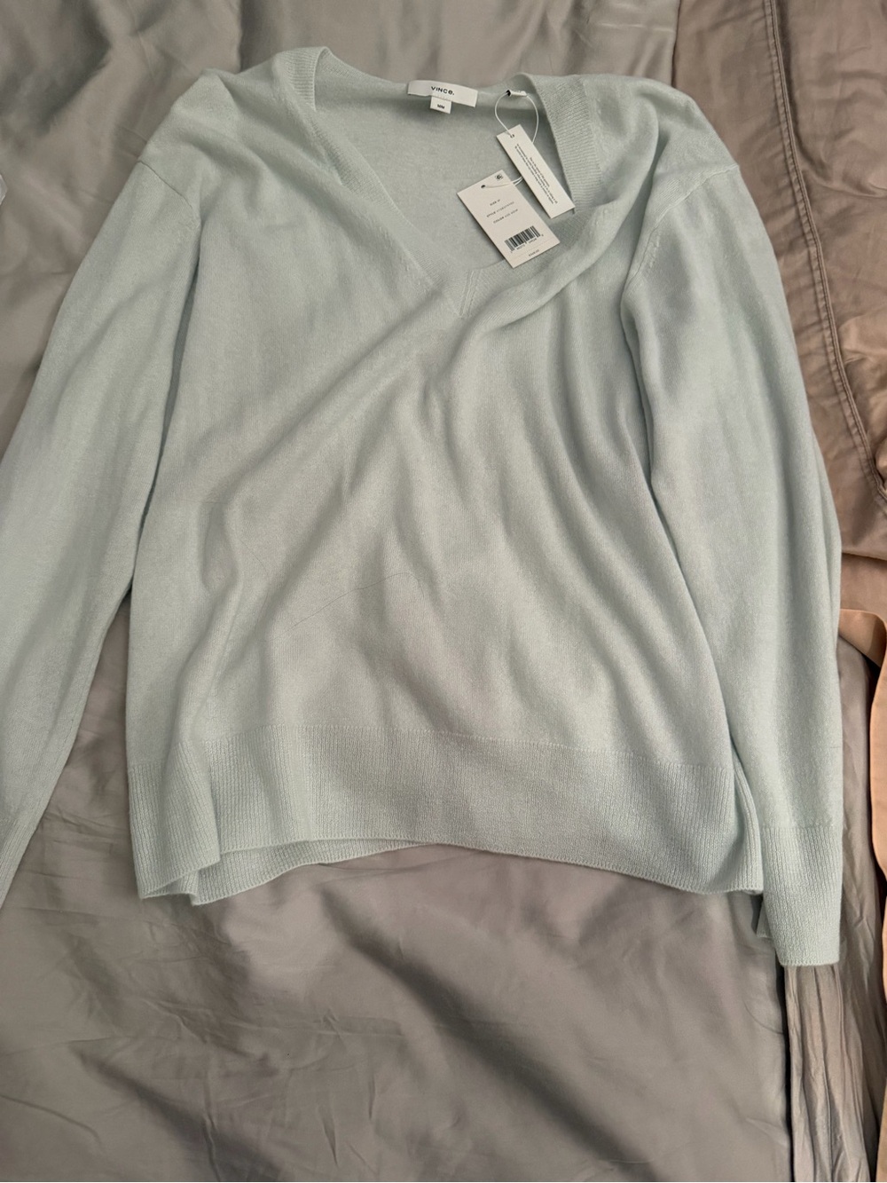 Vince silk and cashmere sweater. Color is a very pale blue. New with tags.